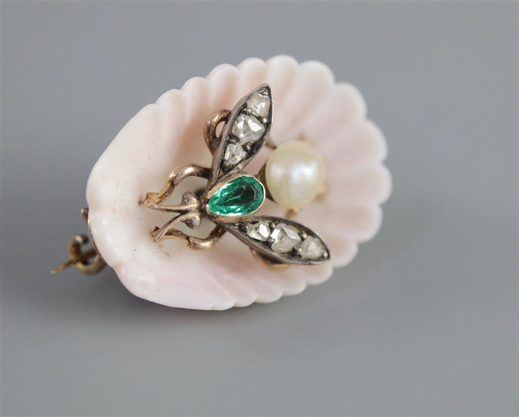 A late Victorian carved coral shell and inset pearl, emerald and rose cut diamond set bug brooch,